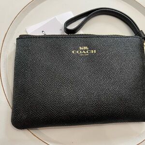 Brand new Coach wristlet